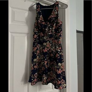 Floral dress. Background is navy